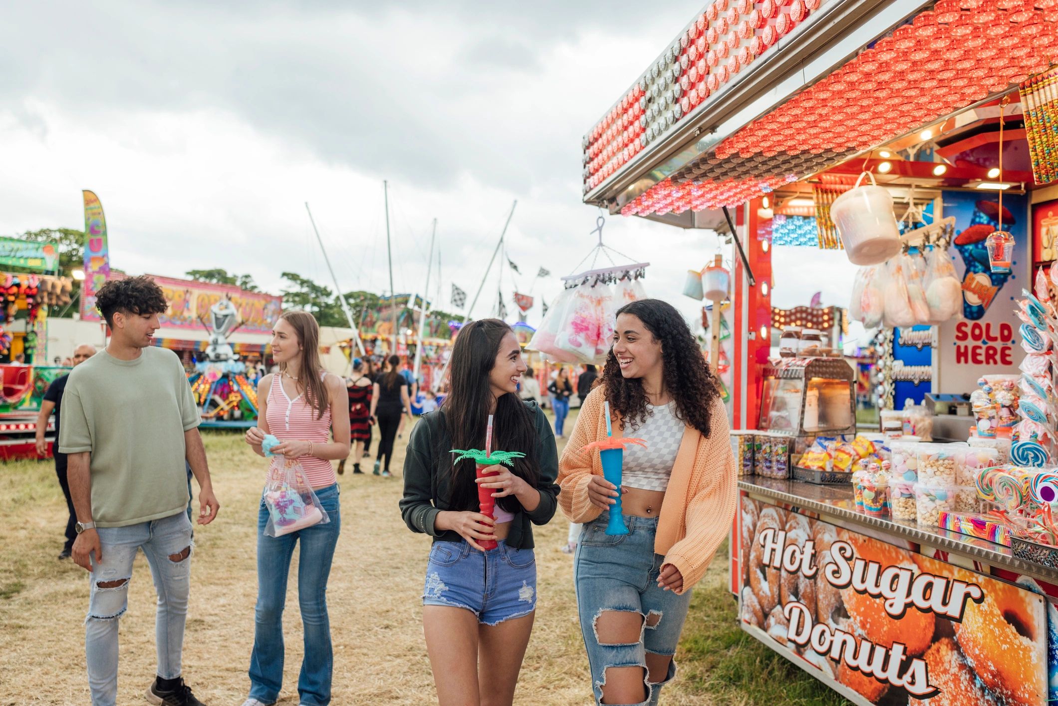 Young visitors enjoying a lively outdoor market scene